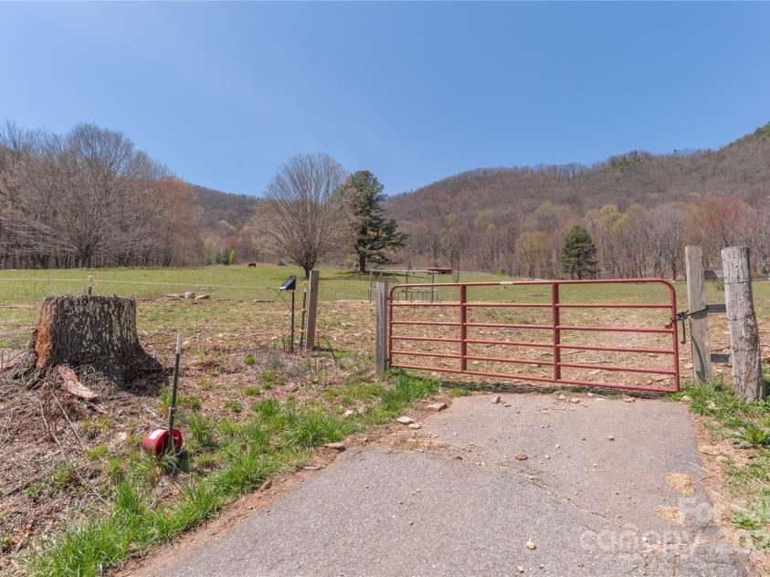 55 Grove Park, Waynesville, NC 28786.  MLS# CAR4218196, YatesRealty ID 8054. Entry to pasture 