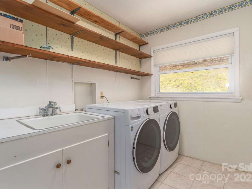 55 Grove Park, Waynesville, NC 28786.  MLS# CAR4218196, YatesRealty ID 8054. Utility room. 