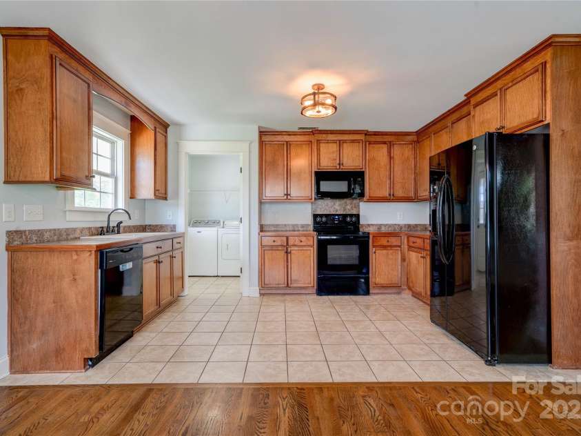 704 Catawba Street, Belmont, NC 28012.  MLS# CAR4249281, YatesRealty ID 8057. Kitchen (all appliances included, including refrigerator)