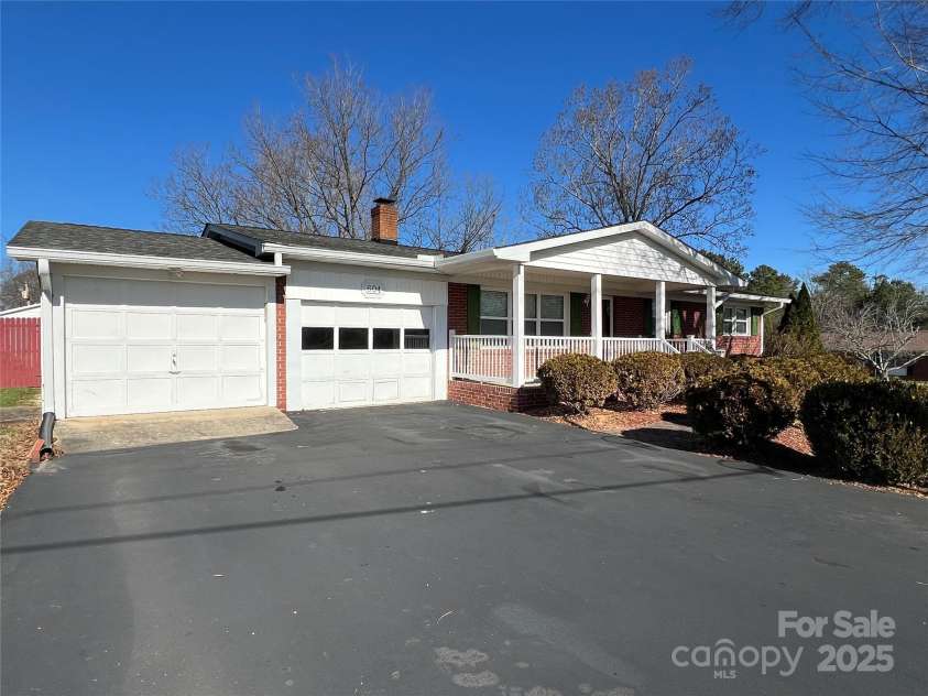 604 Eastwood Drive, Albemarle, NC 28001.  MLS# CAR4210348, YatesRealty ID 8059. 604 Eastwood DriveAlbemarle NC 28001 - Covered Front Porch and 2 car garage