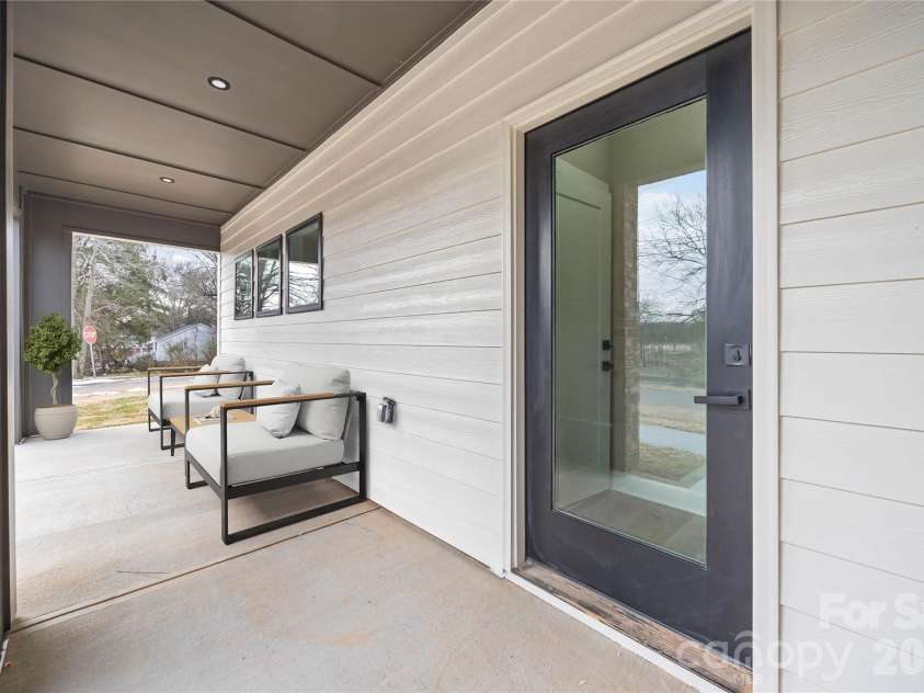 401 Lee Street, Mount Holly, NC 28120.  MLS# CAR4341029, YatesRealty ID 8060. Representative Front Porch Virtually Staged