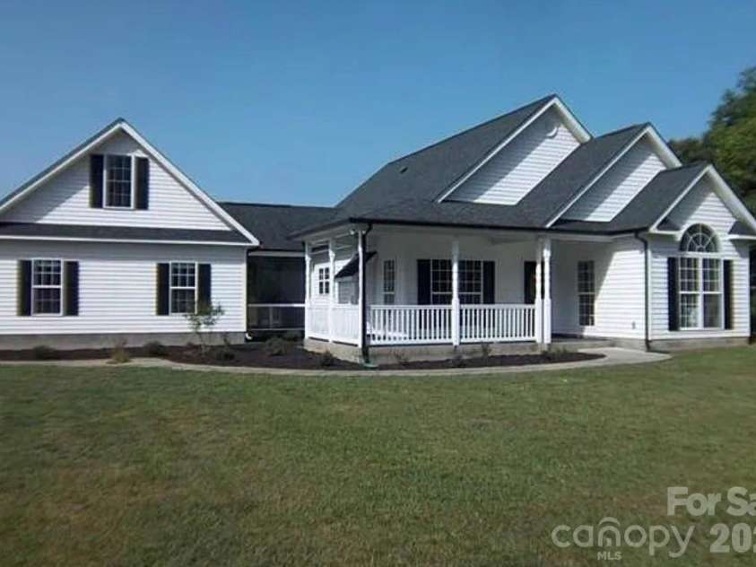 7218 Indian Trail Fairview Road, Indian Trail, NC 28079.  MLS# CAR4337555, YatesRealty ID 8061. Older front view