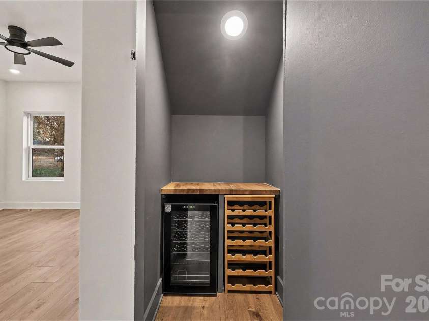 143 Johndy Avenue, Kannapolis, NC 28083.  MLS# CAR4334566, YatesRealty ID 8063. Hidden wine cellar