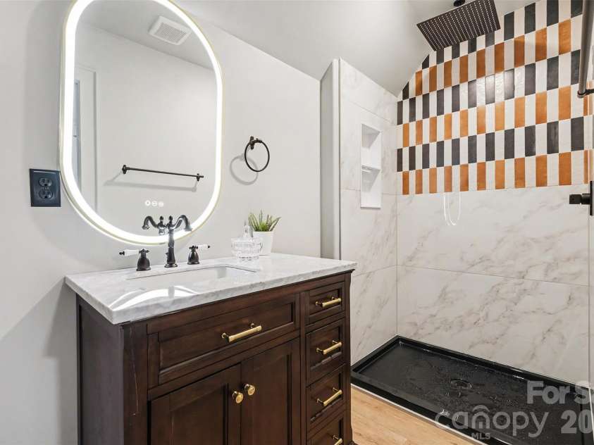 143 Johndy Avenue, Kannapolis, NC 28083.  MLS# CAR4334566, YatesRealty ID 8063. Primary Bathroom