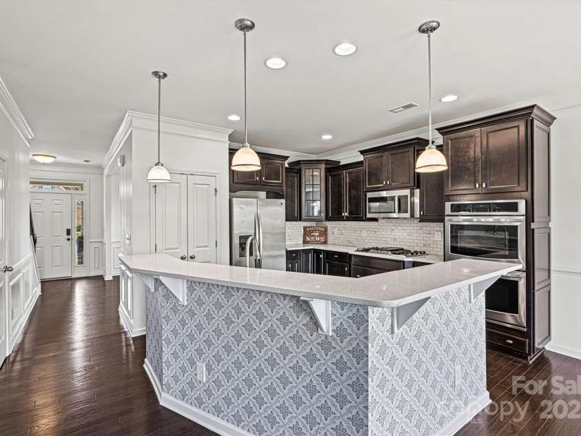 1617 Post Court, Gastonia, NC 28054.  MLS# CAR4246652, YatesRealty ID 8067. Kitchen Breakfast Bar/Foyer Entry View