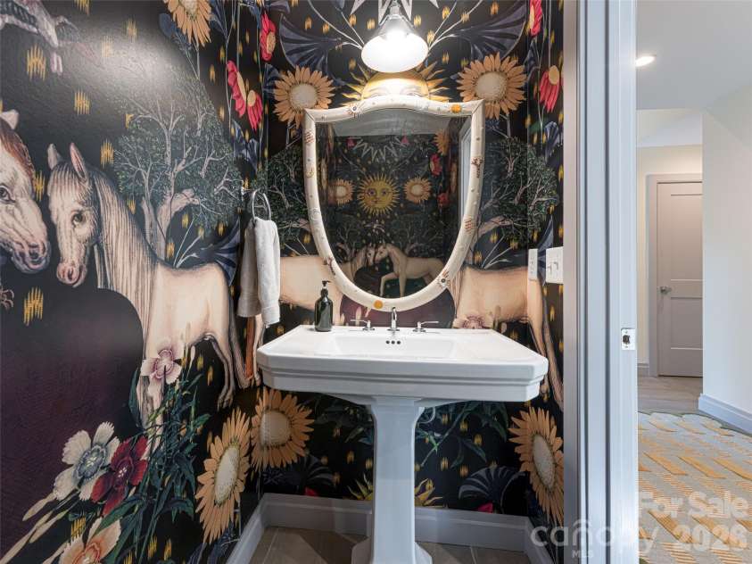17 Beaverdam Court, Asheville, NC 28804.  MLS# CAR4346866, YatesRealty ID 8068. European wall covering in powder room 