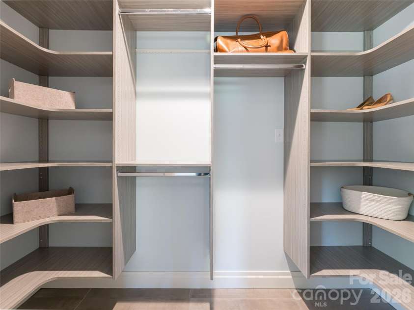 17 Beaverdam Court, Asheville, NC 28804.  MLS# CAR4346866, YatesRealty ID 8068. Primary suite closet