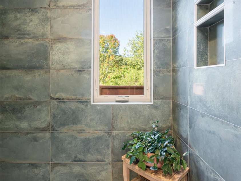 17 Beaverdam Court, Asheville, NC 28804.  MLS# CAR4346866, YatesRealty ID 8068. Walk in shower