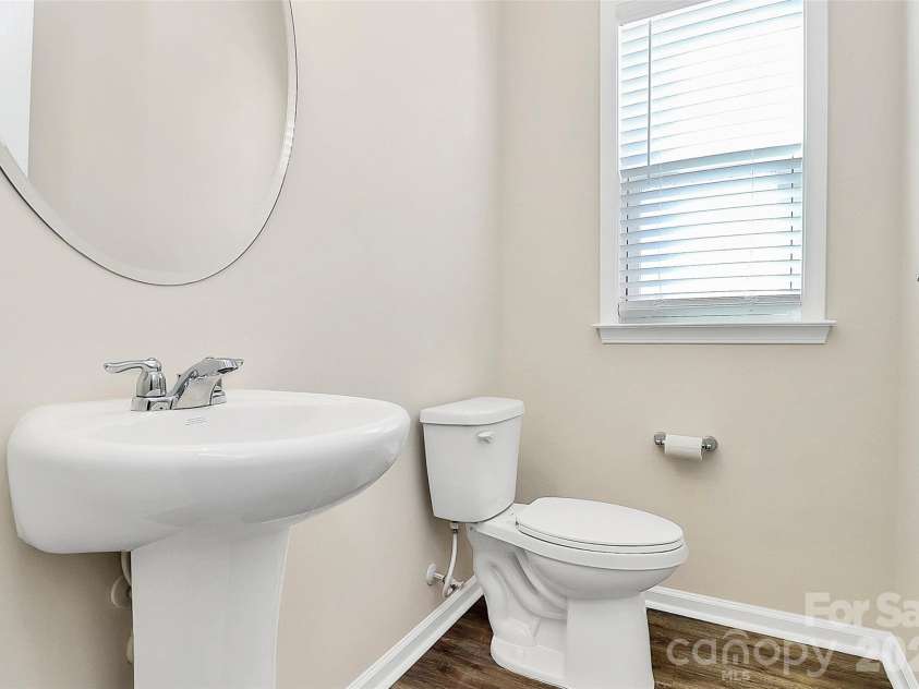 23144 Clarabelle Drive, Charlotte, NC 28273.  MLS# CAR4341725, YatesRealty ID 8070. 1st Floor Half Bath
