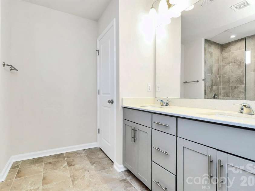 23144 Clarabelle Drive, Charlotte, NC 28273.  MLS# CAR4341725, YatesRealty ID 8070. Primary Bathroom