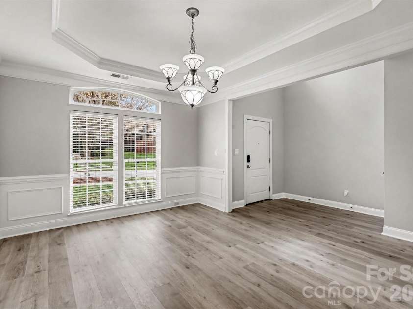 2326 Donnington Lane, Concord, NC 28027.  MLS# CAR4356967, YatesRealty ID 8071. Another view of the Formal Dining Room - Flex Space. This description provides context, specifying it's a different perspective of the room, which also functions as a flexible space.