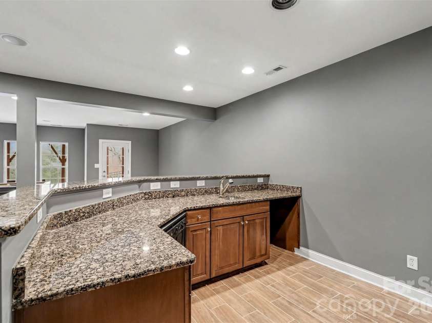 2326 Donnington Lane, Concord, NC 28027.  MLS# CAR4356967, YatesRealty ID 8071. Kitchenette in the basement .