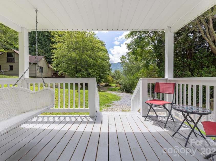 255 Chestnut Hill Road, Burnsville, NC 28714.  MLS# CAR4173831, YatesRealty ID 8073. Enjoy the mountain views from one of two porches!