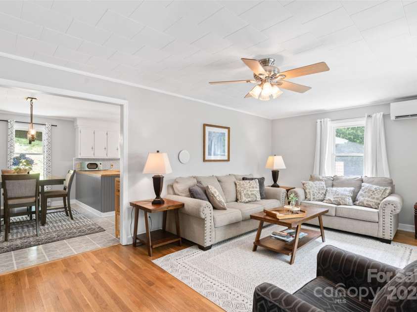 255 Chestnut Hill Road, Burnsville, NC 28714.  MLS# CAR4173831, YatesRealty ID 8073. The Cottage at Chestnut Hill is a charming, 2 BD/1 BA retreat nestled on 1.25 acres, just minutes from downtown Burnsville.