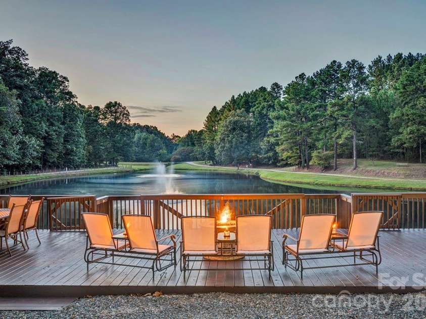 1619 Ellis Belk Road, Monroe, NC 28112.  MLS# CAR4299697, YatesRealty ID 8075. Pond deck/patio. 