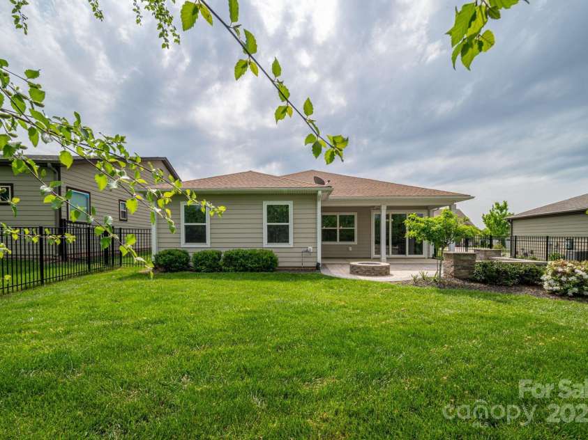 286 Hemlock Bluff Court, Denver, NC 28037.  MLS# CAR4249984, YatesRealty ID 8075. Back of home from rear fence line