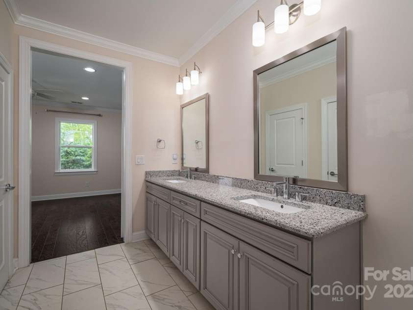 286 Hemlock Bluff Court, Denver, NC 28037.  MLS# CAR4249984, YatesRealty ID 8075. Double sinks and mirrors