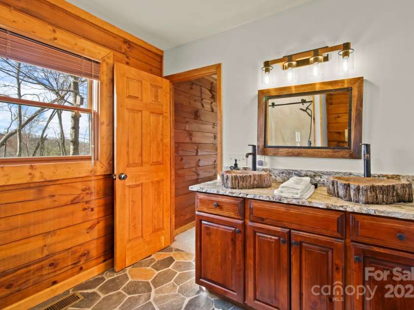 106 Dandelion Lane, Banner Elk, NC 28604.  MLS# CAR4250009, YatesRealty ID 8078. Custom Vanity in Primary Ensuite