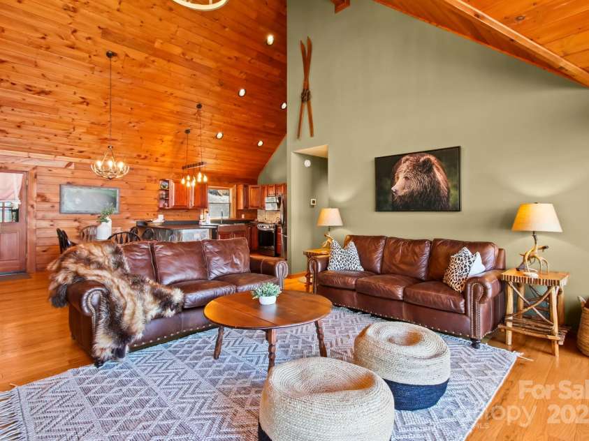 106 Dandelion Lane, Banner Elk, NC 28604.  MLS# CAR4250009, YatesRealty ID 8078. Great Room into Dining and Kitchen.