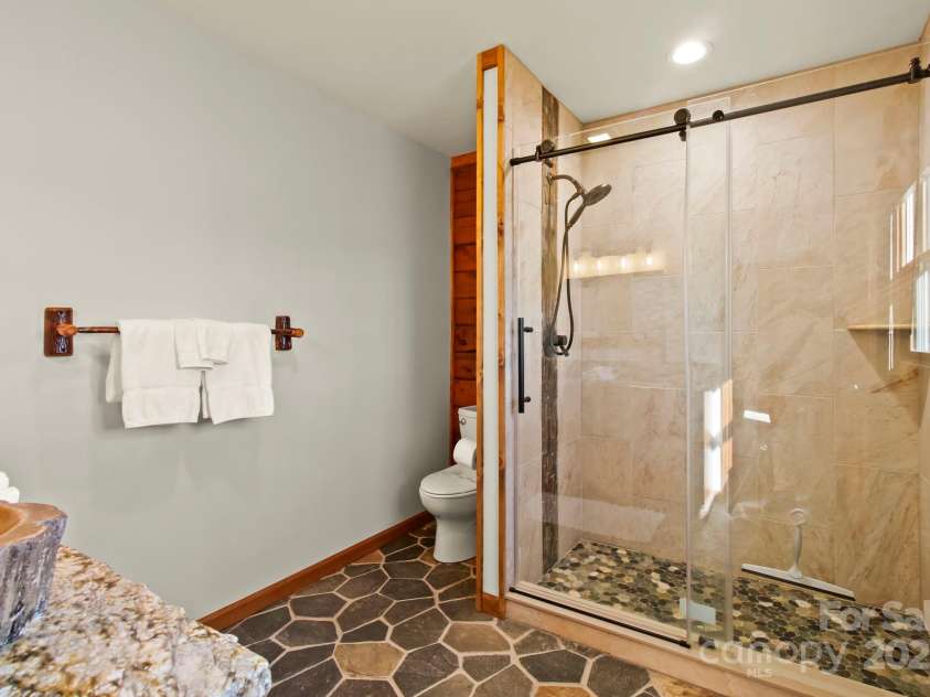 106 Dandelion Lane, Banner Elk, NC 28604.  MLS# CAR4250009, YatesRealty ID 8078. Walk-In Shower in Primary Ensuite