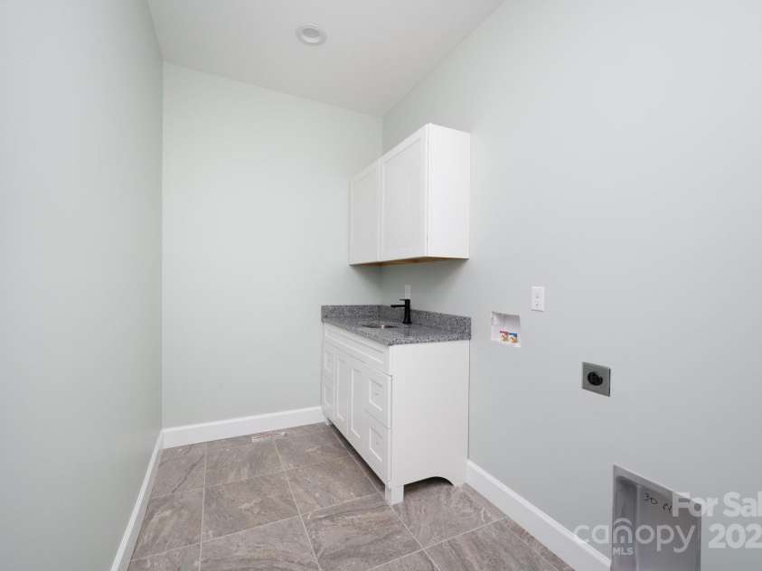 258 Whitfield Lane, Weaverville, NC 28787.  MLS# CAR4177778, YatesRealty ID 8079. Laundry Room with Sink