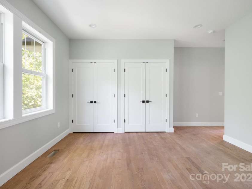 258 Whitfield Lane, Weaverville, NC 28787.  MLS# CAR4177778, YatesRealty ID 8079. Primary Bedroom Closets