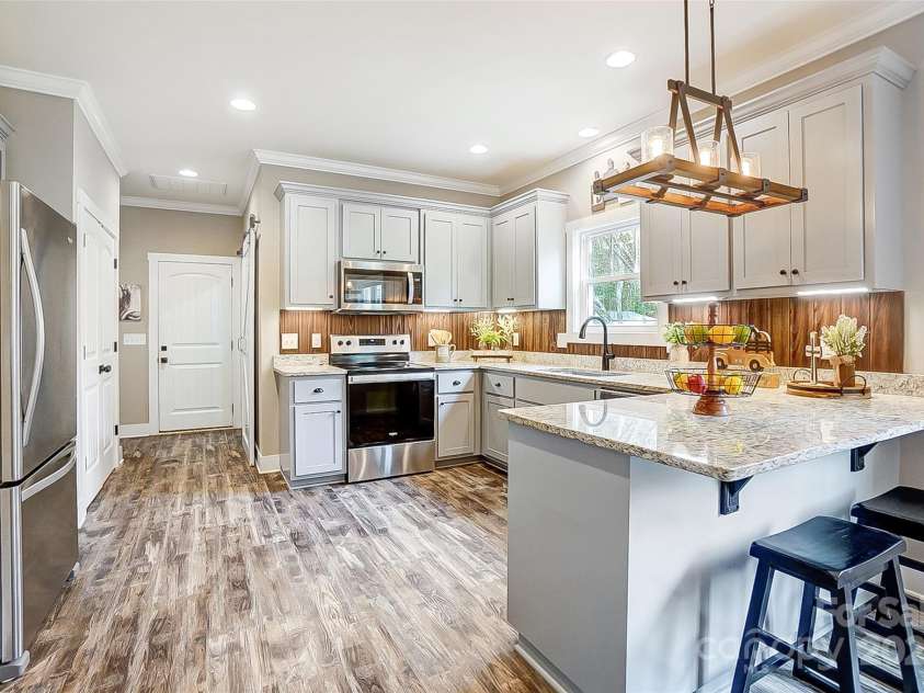 226 Hickory Street, Locust, NC 28097.  MLS# CAR4208541, YatesRealty ID 8083. 