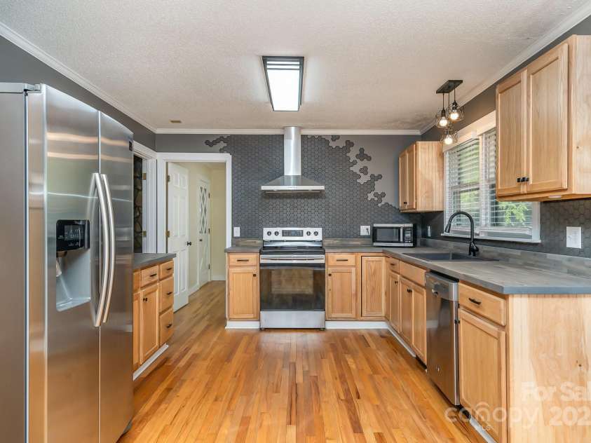 8850 Hills Dell Drive, Concord, NC 28027.  MLS# CAR4228638, YatesRealty ID 8086. 