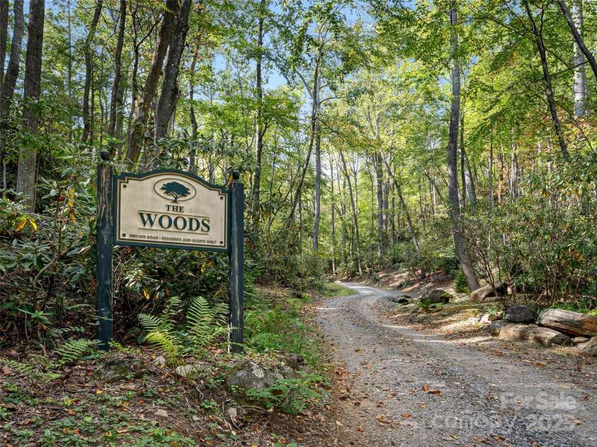 1299 Pine Ridge Road, Burnsville, NC 28714.  MLS# CAR4306270, YatesRealty ID 8091. The Woods community offers peace and tranquility