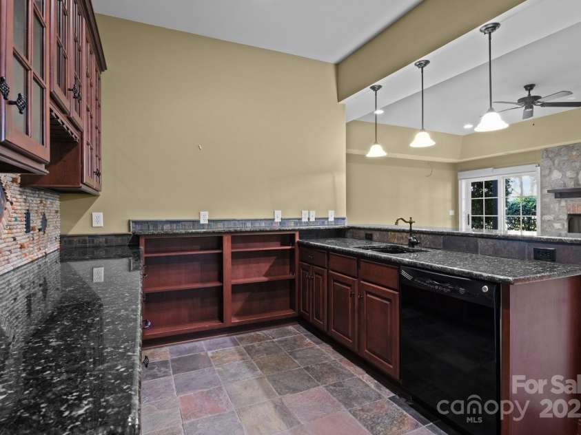 8034 Bay Pointe Drive, Denver, NC 28037.  MLS# CAR4223760, YatesRealty ID 8094. Basement kitchenette.