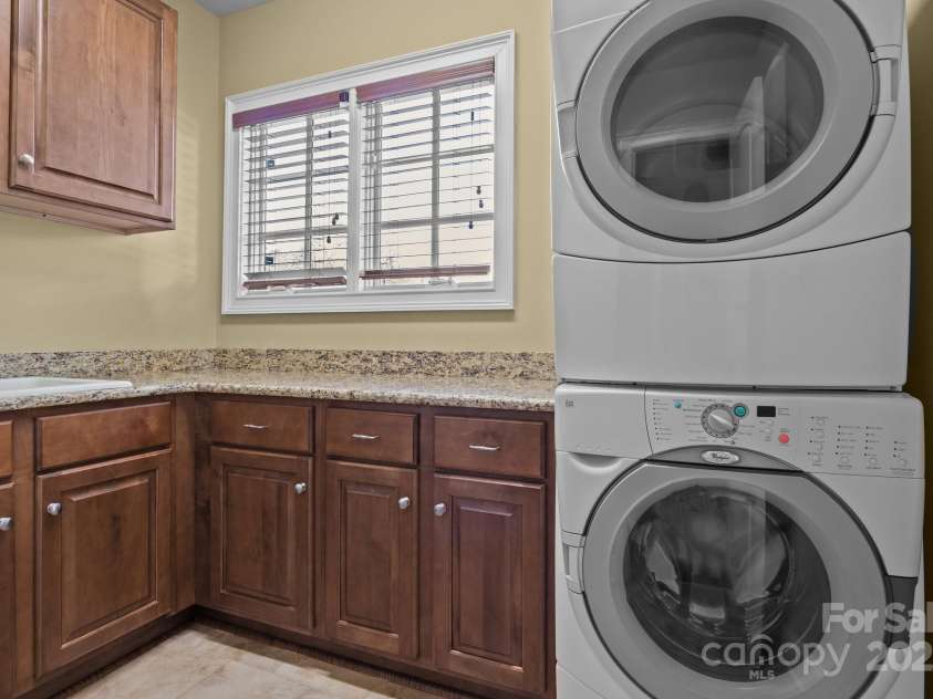 8034 Bay Pointe Drive, Denver, NC 28037.  MLS# CAR4223760, YatesRealty ID 8094. Laundry room.