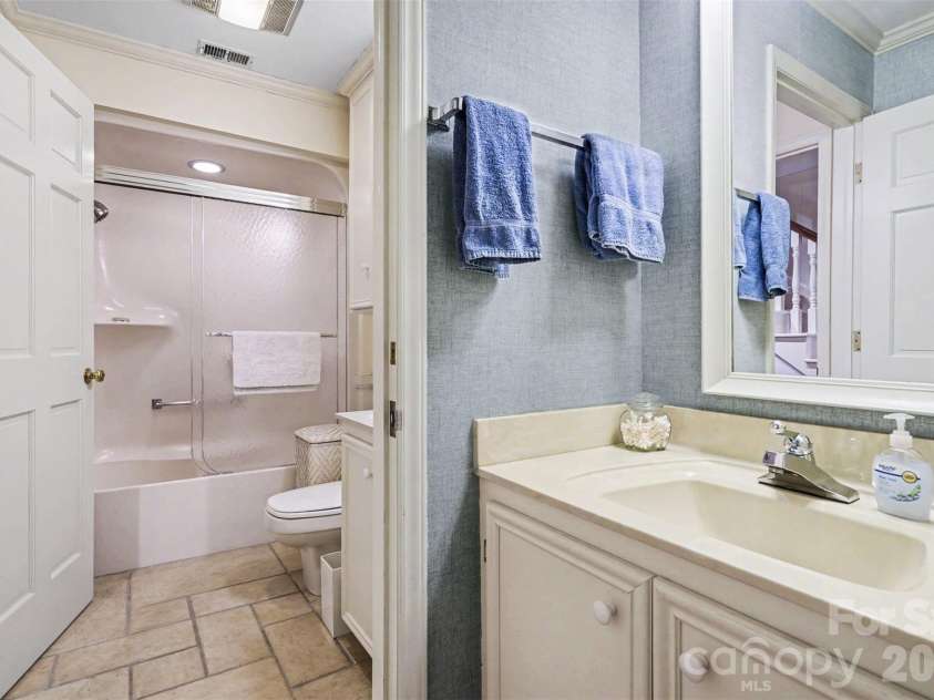 212 Deerchase Road, Shelby, NC 28150.  MLS# CAR4360105, YatesRealty ID 8095. The full bath in the basement has two vanities.