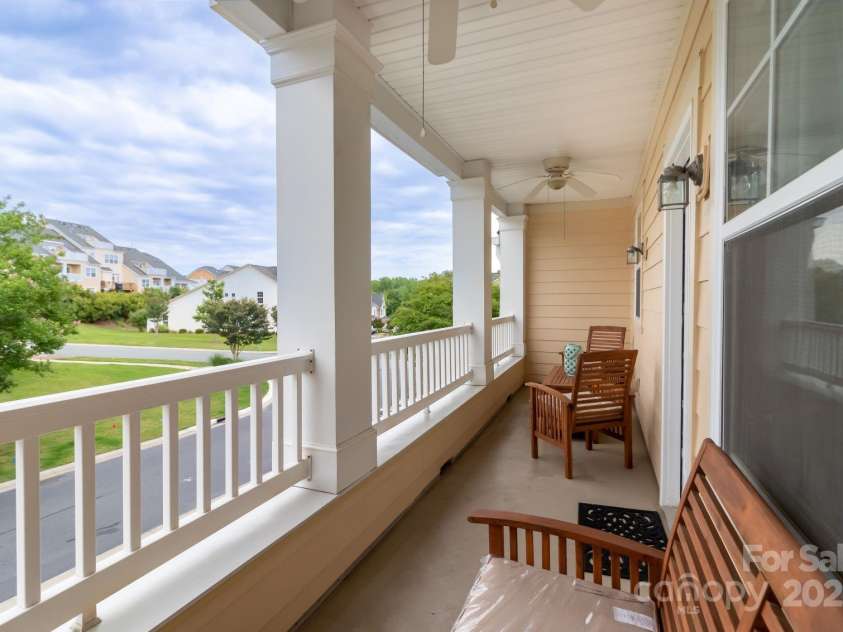 609 Sunfish Lane, Tega Cay, SC 29708.  MLS# CAR4233683, YatesRealty ID 8096. Covered Porch off of Dining Area