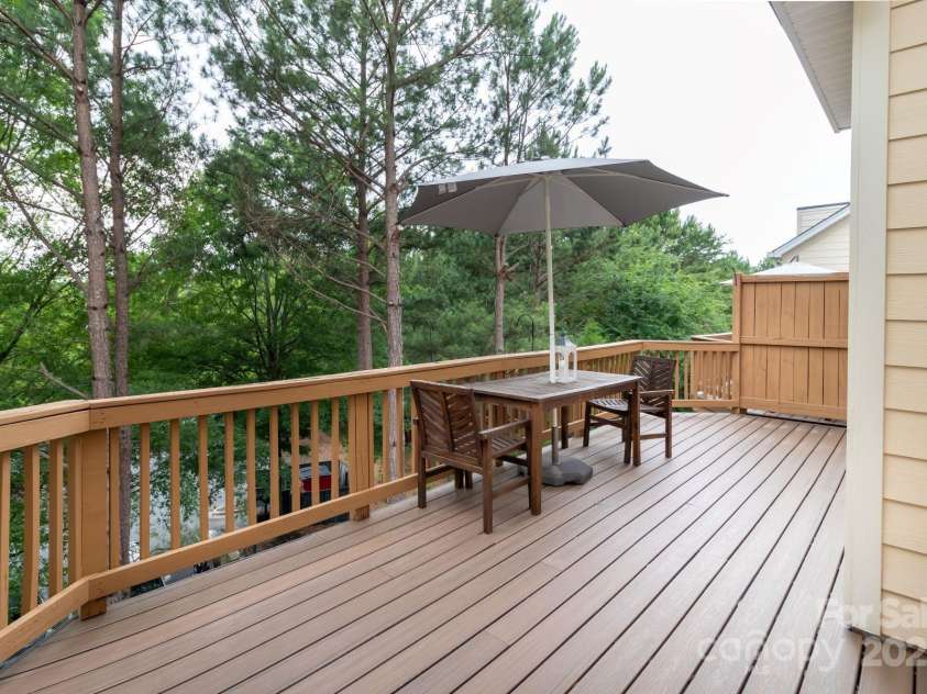 609 Sunfish Lane, Tega Cay, SC 29708.  MLS# CAR4233683, YatesRealty ID 8096. Deck off of Family Room