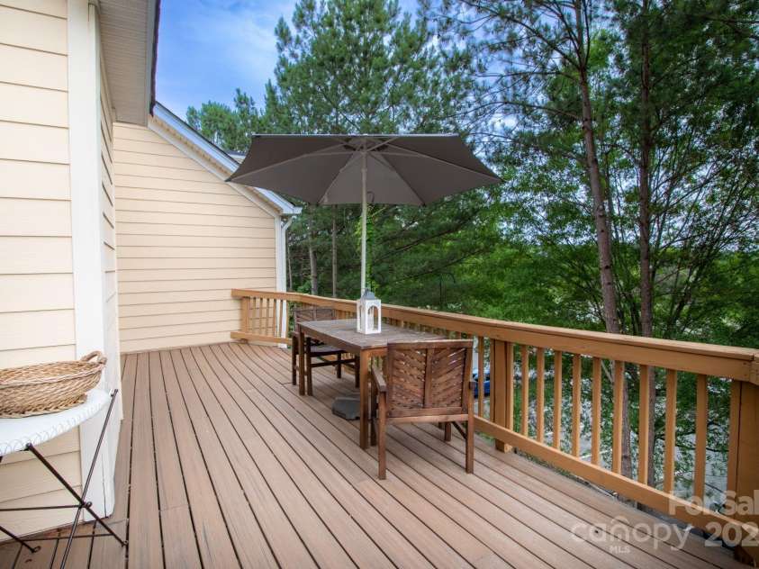 609 Sunfish Lane, Tega Cay, SC 29708.  MLS# CAR4233683, YatesRealty ID 8096. Deck off of Family Room
