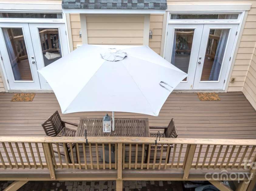 609 Sunfish Lane, Tega Cay, SC 29708.  MLS# CAR4233683, YatesRealty ID 8096. Deck off of Family Room