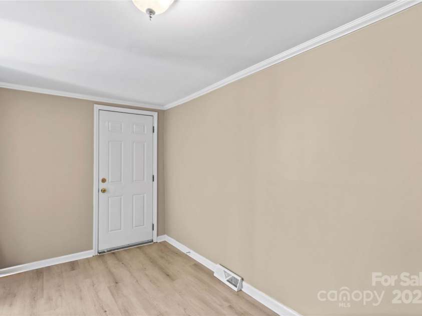 216 Georgia Avenue, Bessemer City, NC 28016.  MLS# CAR4240222, YatesRealty ID 8098. Laundry Room is Huge! Side Door entrance; New Luxury Plank Flooring