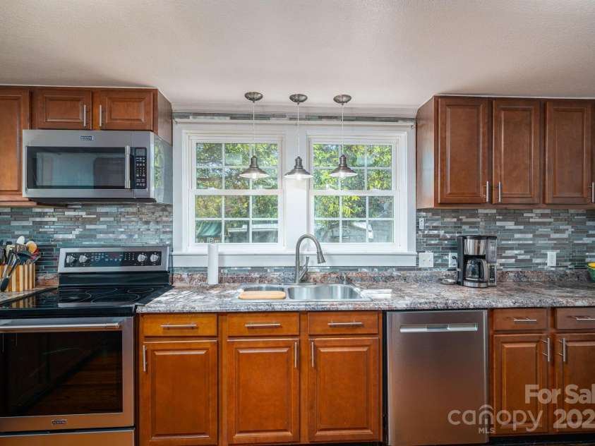 1481 Depot Street, Iron Station, NC 28080.  MLS# CAR4315065, YatesRealty ID 810. 