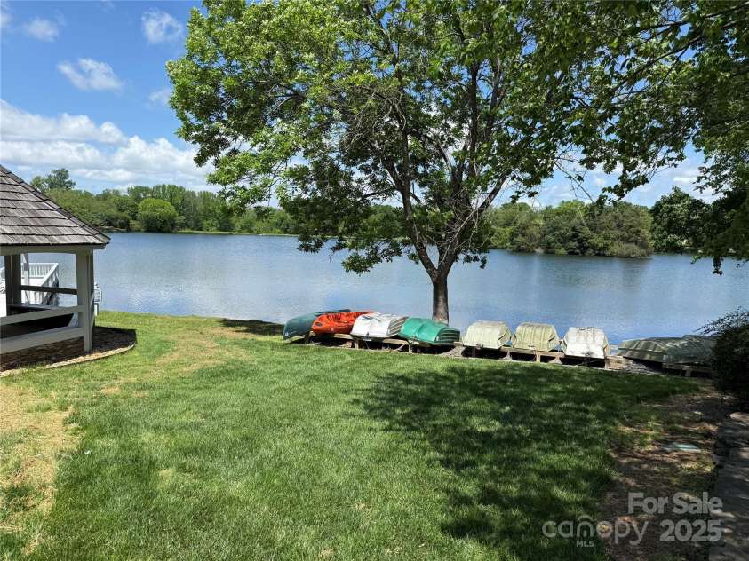 8623 Tullamore Park Circle, Charlotte, NC 28226.  MLS# CAR4242988, YatesRealty ID 8107. Kayaks for outdoor enjoyment on the lake