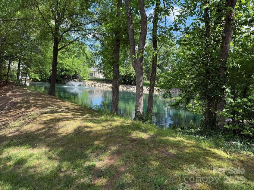 8623 Tullamore Park Circle, Charlotte, NC 28226.  MLS# CAR4242988, YatesRealty ID 8107. Neighborhood Pond with fountain