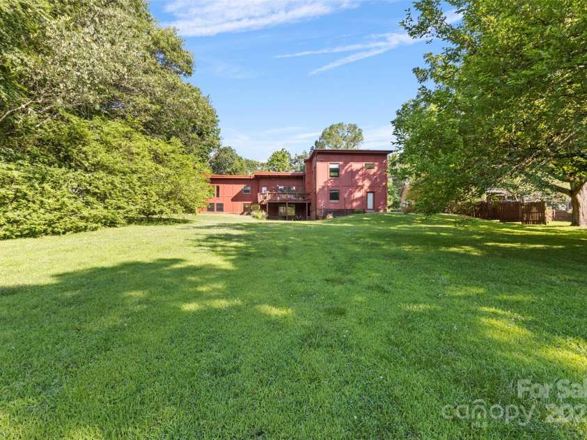 640 Davie Avenue, Statesville, NC 28677.  MLS# CAR4156383, YatesRealty ID 8108. Beautiful Private Backyard