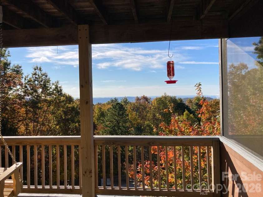 121 Toxaway Views Drive, Lake Toxaway, NC 28747.  MLS# CAR4414646, YatesRealty ID 8111. From Homeowner - Another Fall view from deck