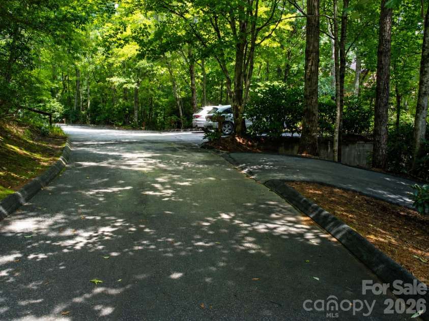 121 Toxaway Views Drive, Lake Toxaway, NC 28747.  MLS# CAR4414646, YatesRealty ID 8111. Subdivision Road