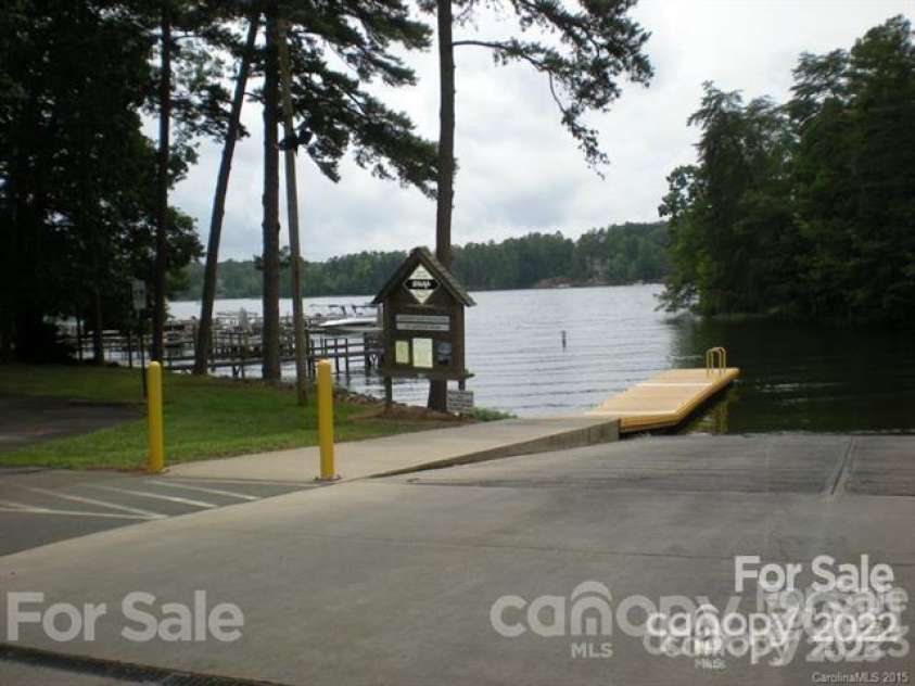 139 Sanford Lane, Badin Lake, NC 28127.  MLS# CAR4246223, YatesRealty ID 8117. Paved, public Whip-O-Will Wildlife boat landing within the neighborhood.