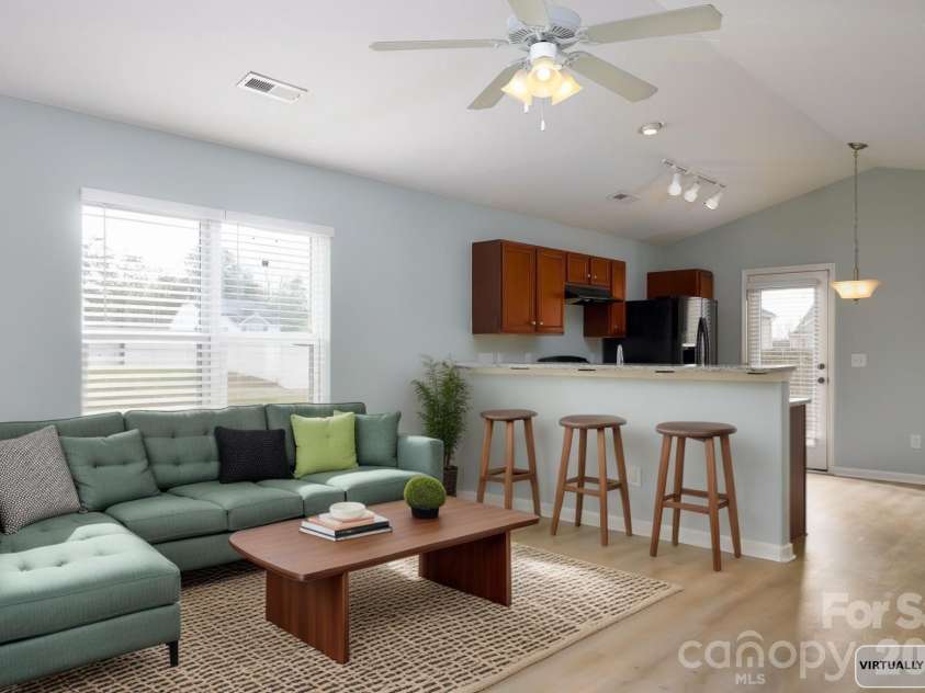 1150 Red Sage Road, Winston Salem, NC 27127.  MLS# CAR4364862, YatesRealty ID 8121. Virtually staged open concept living room