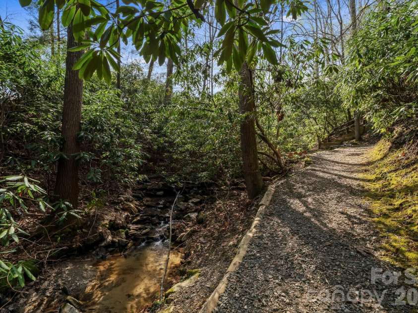 25 Owl Creek Lane, Fairview, NC 28730.  MLS# CAR4365115, YatesRealty ID 8127. Community