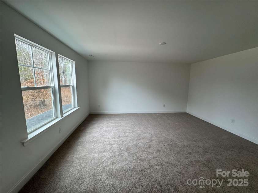 107 Spring View Lane, Statesville, NC 28677.  MLS# CAR4221488, YatesRealty ID 813. Primary Bedroom