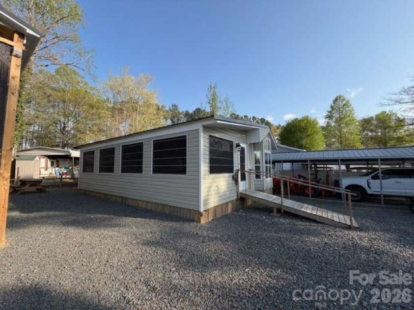 140 Hide A Way Trail, Mount Gilead, NC 27306.  MLS# CAR4365293, YatesRealty ID 8132. 