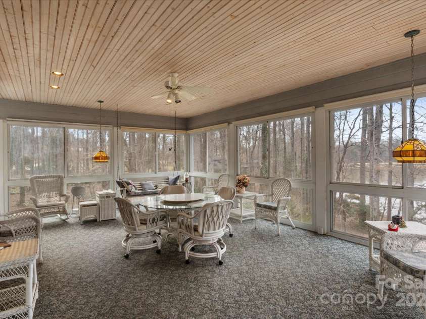 98 Fox Trail, Tryon, NC 28782.  MLS# CAR4232622, YatesRealty ID 8133. 400+ SQ ft sun porch.