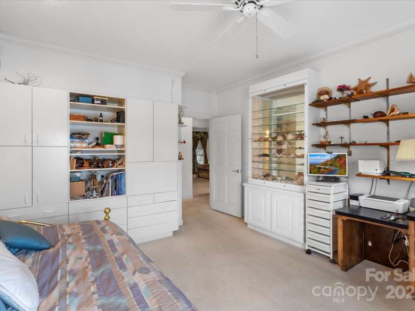 98 Fox Trail, Tryon, NC 28782.  MLS# CAR4232622, YatesRealty ID 8133. Built-ins in bedroom.